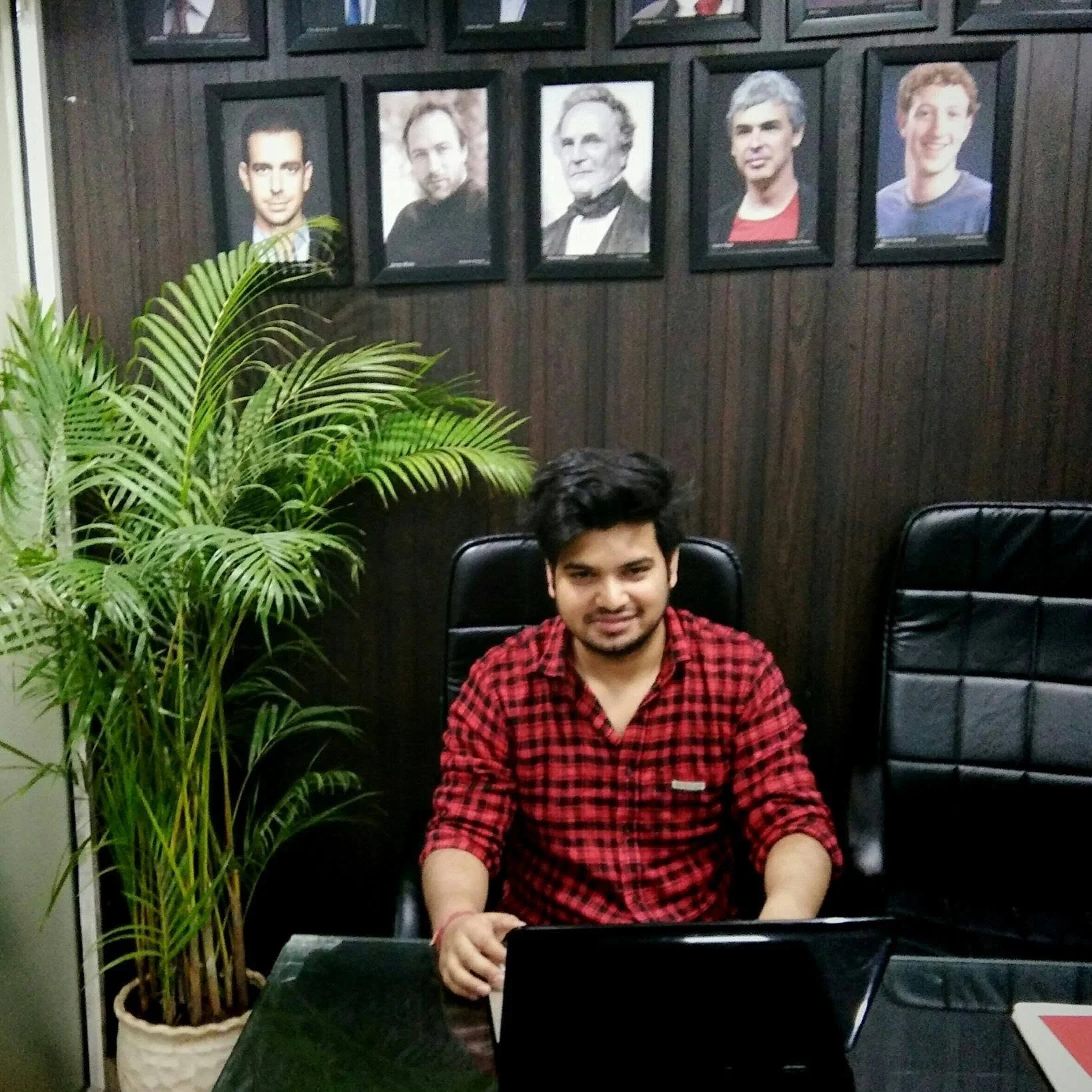 Mukesh Kumar working at a laptop